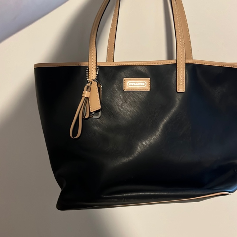 Sleek black coach bag